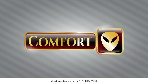  Golden emblem with alien icon and Comfort text inside