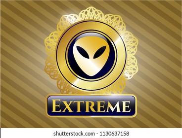  Golden emblem with alien icon and Extreme text inside