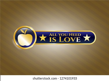  Golden emblem with apple icon and All you Need is Love text inside