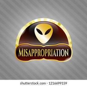  Golden emblem or badge with alien icon and Misappropriation text inside