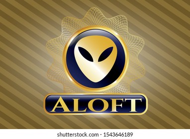  Golden emblem or badge with alien icon and Aloft text inside