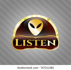  Golden emblem or badge with alien icon and Listen text inside