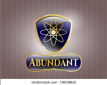  Golden emblem or badge with atom icon and Abundant text inside