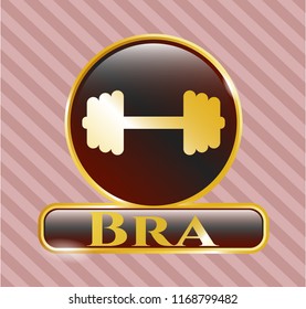  Golden emblem or badge with big dumbbell icon and Bra text inside