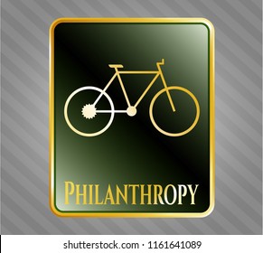  Golden emblem or badge with bike icon and Philanthropy text inside