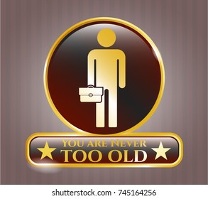  Golden emblem or badge with businessman holding briefcase icon and You are Never too old text inside