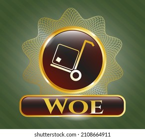 Golden emblem or badge with cargo icon and Woe text inside