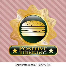  Golden emblem or badge with cheeseburger icon and Positive Thinking text inside