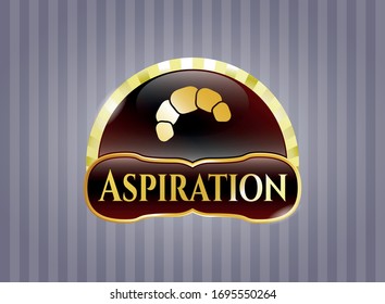  Golden emblem or badge with croissant icon and Aspiration text inside