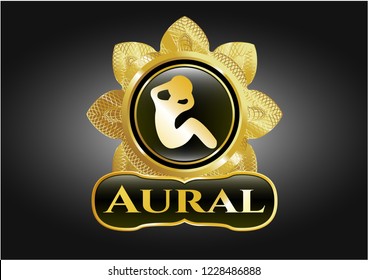  Golden emblem or badge with crunch icon and Aural text inside