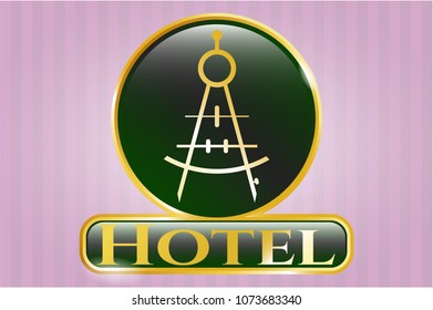   Golden emblem or badge with drawing compass icon and Hotel text inside