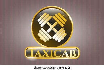  Golden emblem or badge with dumbbell icon and Taxicab text inside