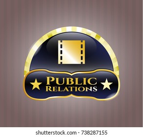  Golden emblem or badge with film icon and Public Relations text inside