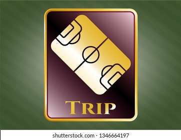  Golden emblem or badge with football field icon and Trip text inside