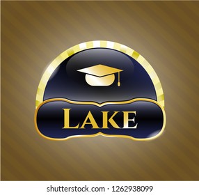  Golden emblem or badge with graduation cap icon and Lake text inside