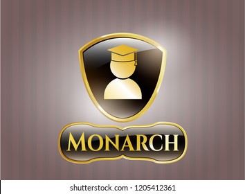  Golden emblem or badge with graduation icon and Monarch text inside