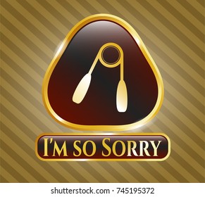 Golden emblem or badge with hand gripper icon and I'm so Sorry text inside