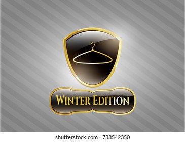  Golden emblem or badge with hanger icon and Winter Edition text inside