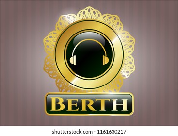  Golden emblem or badge with headphones icon and Berth text inside