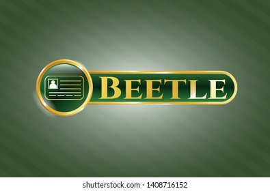  Golden emblem or badge with identification card icon and Beetle text inside