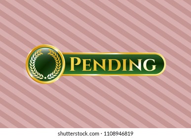   Golden emblem or badge with laurel wreath icon and Pending text inside