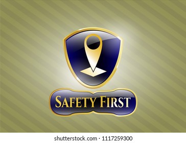  Golden emblem or badge with map pointer icon and Safety First text inside