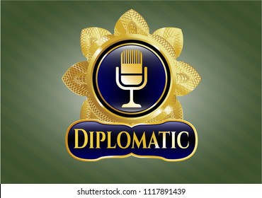  Golden emblem or badge with microphone icon and Diplomatic text inside