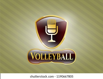  Golden emblem or badge with microphone icon and Volleyball text inside