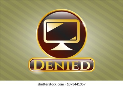  Golden emblem or badge with monitor icon and Denied text inside