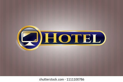  Golden emblem or badge with monitor icon and Hotel text inside