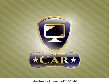  Golden emblem or badge with monitor icon and Car text inside