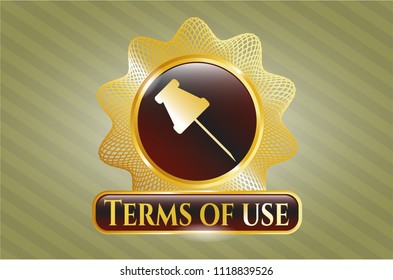  Golden emblem or badge with paper pin icon and Terms of use text inside