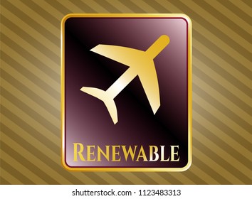  Golden emblem or badge with plane icon and Renewable text inside