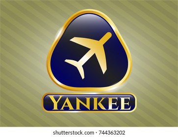  Golden emblem or badge with plane icon and Yankee text inside