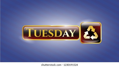 Golden emblem or badge with recycle icon and Tuesday text inside
