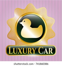  Golden emblem or badge with rubber duck icon and Luxury Car text inside