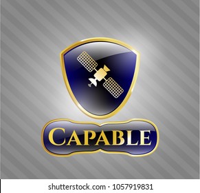  Golden emblem or badge with satelite icon and Capable text inside