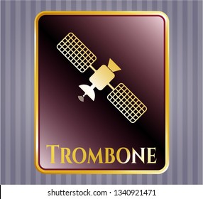  Golden emblem or badge with satelite icon and Trombone text inside