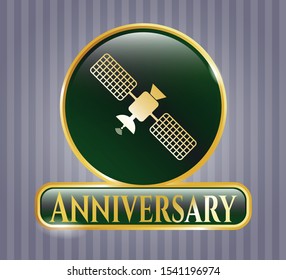  Golden emblem or badge with satelite icon and Anniversary text inside