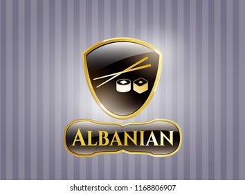  Golden emblem or badge with sushi icon and Albanian text inside