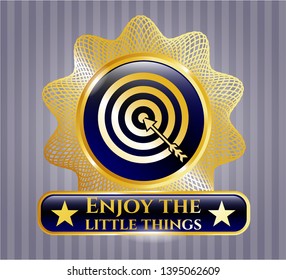  Golden emblem or badge with target, business icon and Enjoy the little things text inside