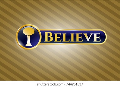  Golden emblem or badge with tree icon and Believe text inside