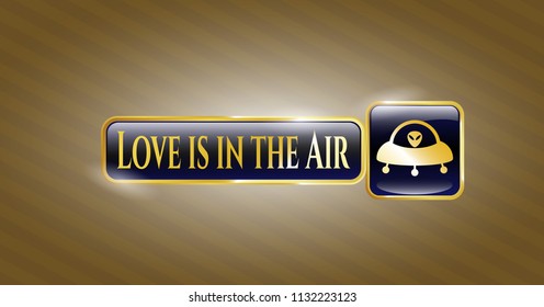  Golden emblem or badge with ufo with aline inside icon and Love is in the Air text inside