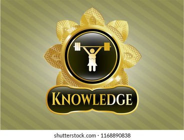  Golden emblem or badge with weightlifter girl icon and Knowledge text inside
