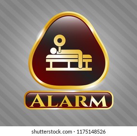  Golden emblem with bench press icon and Alarm text inside