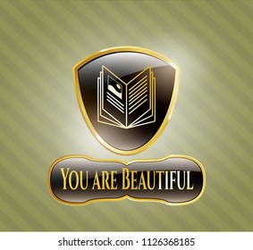 Golden emblem with book icon and You are Beautiful text inside