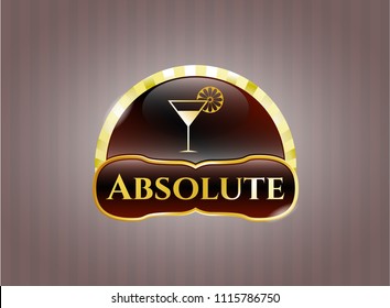  Golden emblem with cocktail glass icon and Absolute text inside