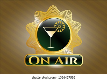  Golden emblem with cocktail glass icon and On Air text inside