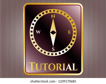   Golden emblem with compass icon and Tutorial text inside