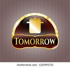  Golden emblem with cooking pot icon and Tomorrow text inside